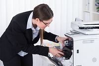 Sửa máy in bị lỗi kẹt giấy do rách bao lụa